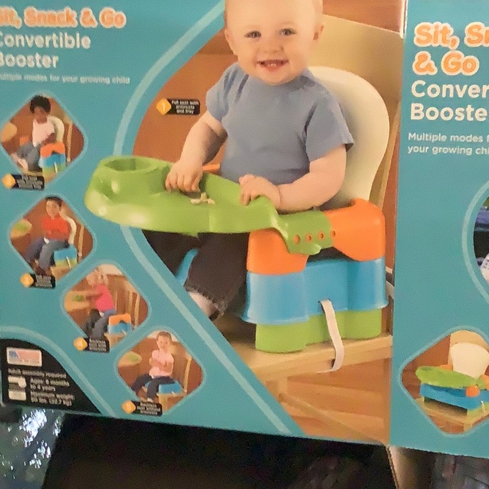 Safety First. Child booster seat with removable tray.NWOT. Open box.